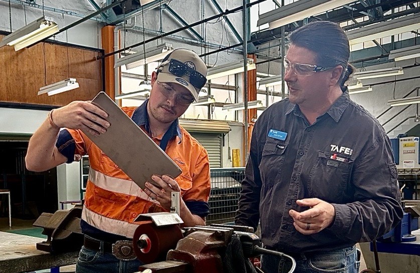 Student apprentice and teacher at the new Tighes Hill facility