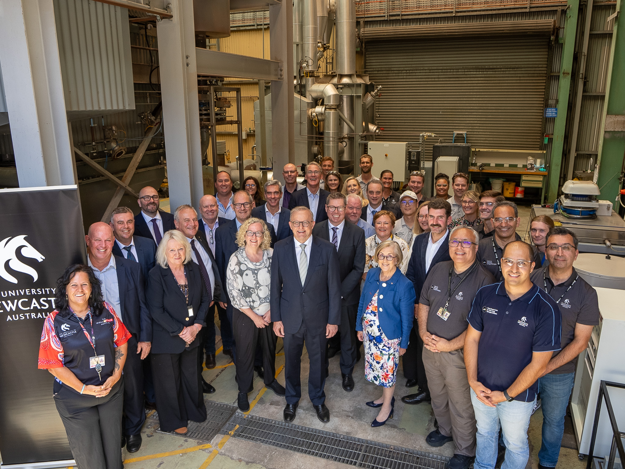 The Prime Minister of Australia surrounded by teachers and students at the University of Newcastle